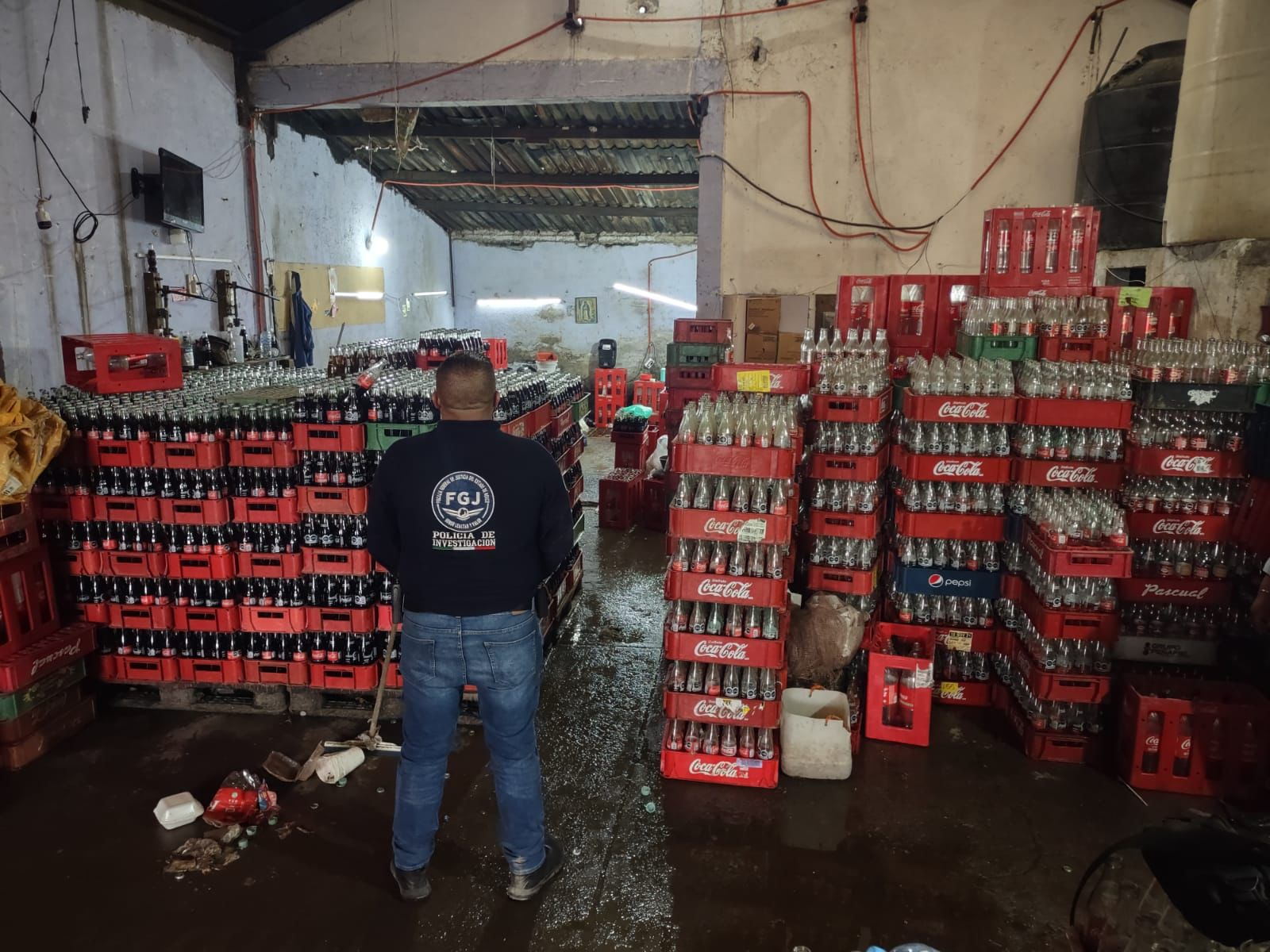 Vinculan a proceso a 10 detenidos por fábrica de Coca-Cola pirata en Edomex