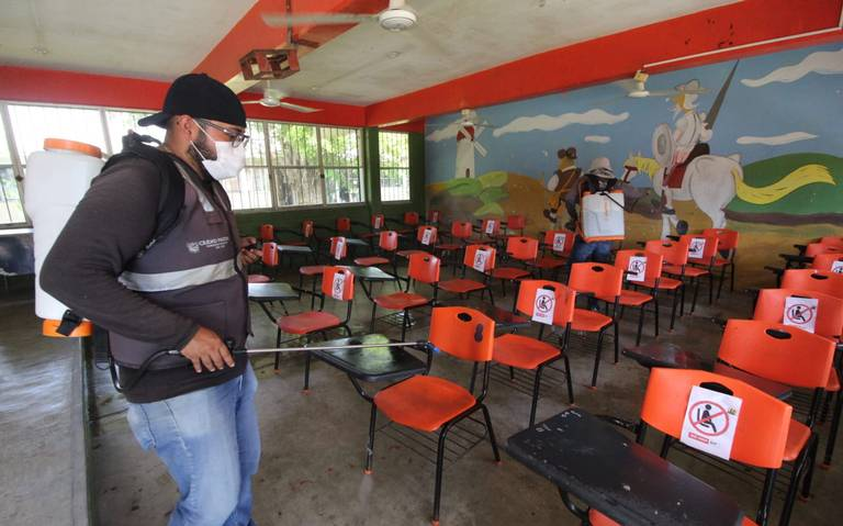 Reportan alumnos afectados en piel y garganta por fumigación contra dengue
